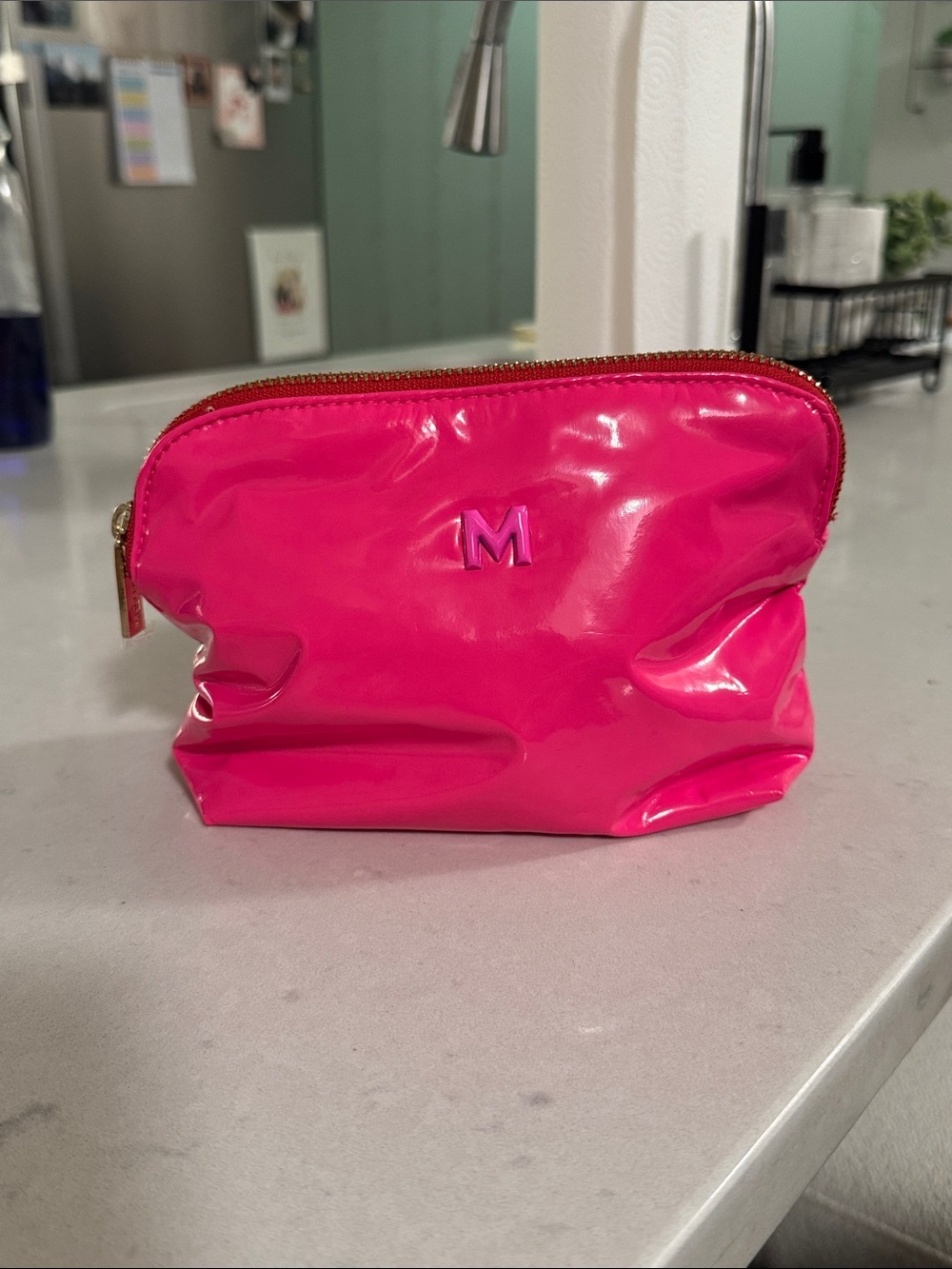 BaubleBar Hot Pink Glossy Cosmetic Pouch with 'M' Accent